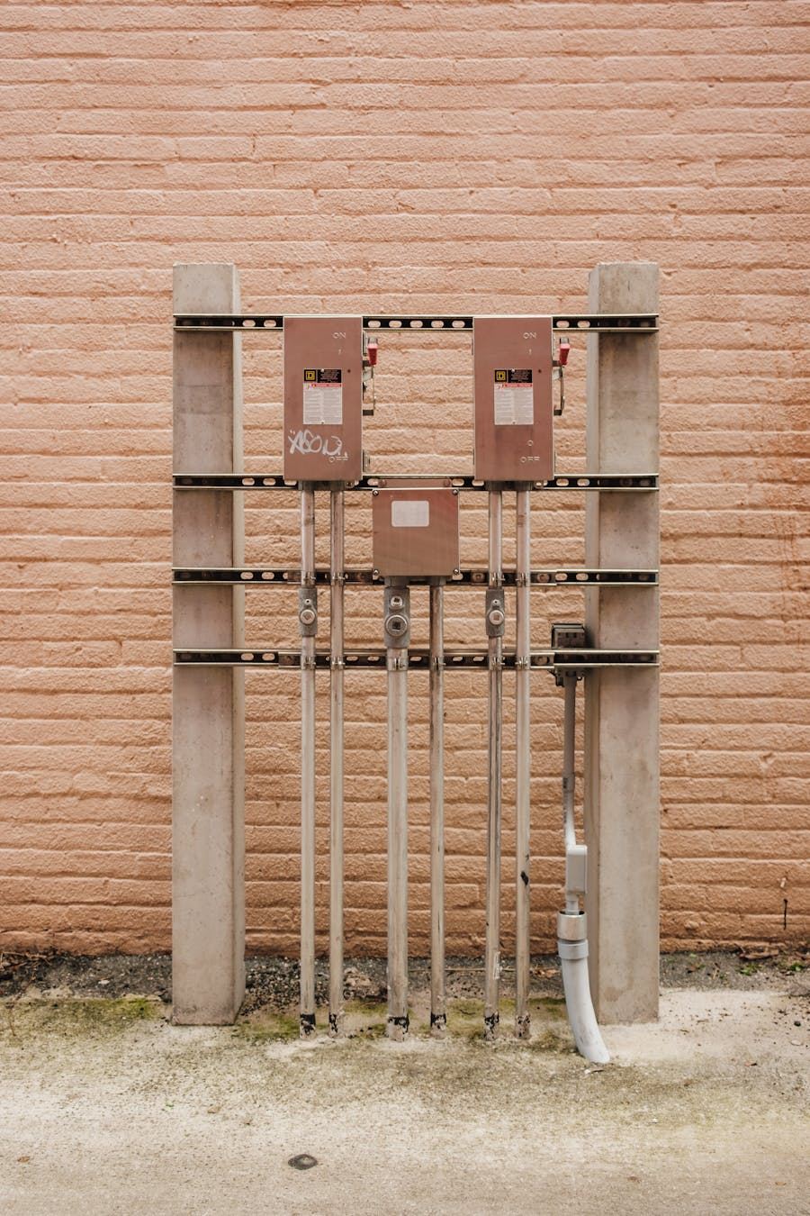 Street mounted electricity boxes and meters with pipes and wiring