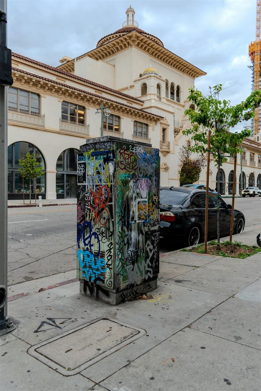 Painted electricity cabinet on a city sidewalk